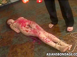 Kinky asian slavegirl gets drenched in...