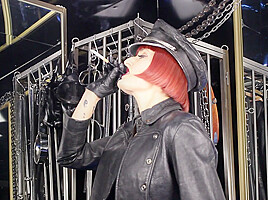 Mistress tokyo smoking cigarette in leather,...