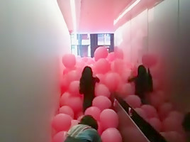 Mass pink balloon burst...