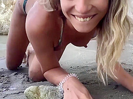 Blonde double squirt on island beach...