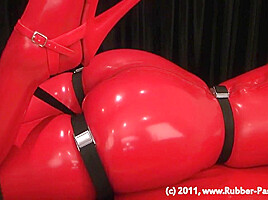 Rubbedpassion red bondage doll...