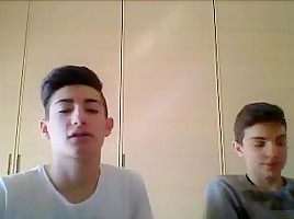 2 cute italian boys show their...