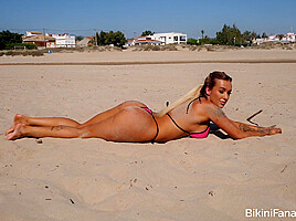 Busty Bikini Model Exposes Her Boobs...
