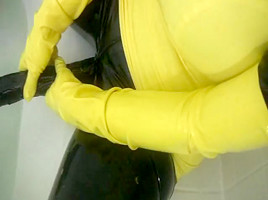 Yellow spandex uniform has orgasm in...
