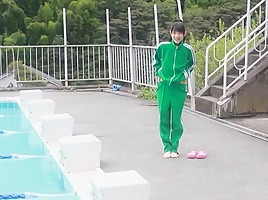 Japanese girl swim in pool with...