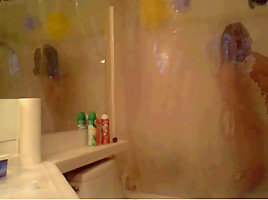 Tranny taking a shower and masturbate...