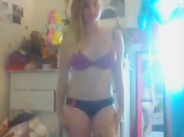 College girl films herself getting naked in her room