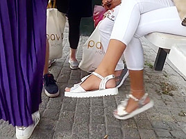 Sexy playful toes in sandals...
