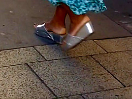 Candid ebony mature in wedge sandals...