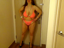 Tinja Shows Dangerous Curves In An Orange String Bikini...