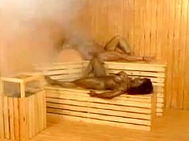 Two lesbian body builders at sauna...