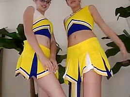 Two attractive cheerleaders introduce each other...
