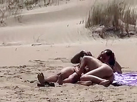 Couple on a nude beach