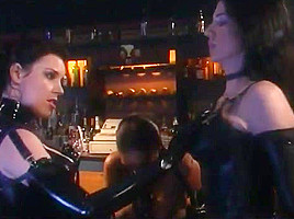 Leather clad lesbos get nasty on...