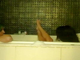 Two girls bathtub...