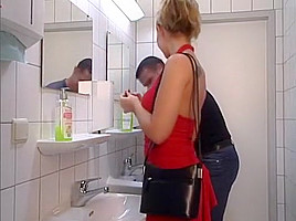 Lady in red in toilet swallow...