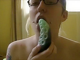 blond chick fucks herself with tentacle dildo