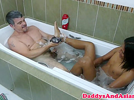 Dilf sucking twinks toes in bath...
