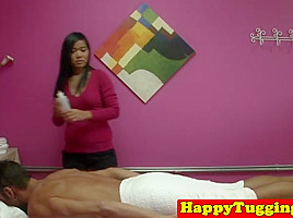 Real Asian Masseuse Wanking Clients Dick...