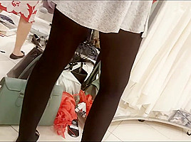 In mini skirt and black pantyhose...