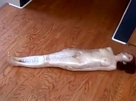 Plasticwrapped mummified girl...