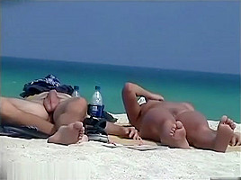 Naked Tourists Caught On Beach Spy Cam Relaxing And Enjoying Nudity...