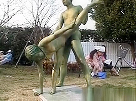 Asian chick statue getting some sex...