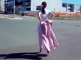 L ady in pink ballet boots...