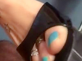 Sexy blue toenails in black highheels...