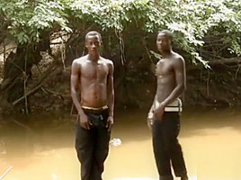 Black young boys in the river...