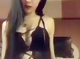 Cute Chinese Cam Girl Teases In Black Dress...