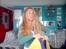 Woman Shows Off Her New Yellow Raincoat And Long S...
