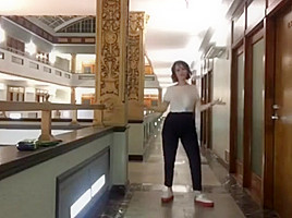 Milana vayntrub dancing in a hallway...