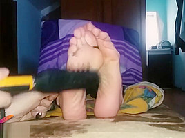Tickle torture for ticklish feet