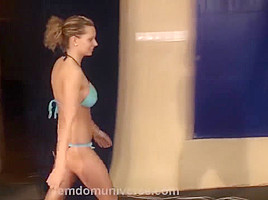 Hot bikini babe humiliates wimp wrestling...