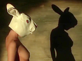 Rabbit masked girl naked dancing