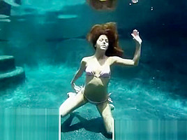 Brunette Beauty Topless Underwater...