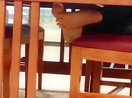 Candid bare feet in library...