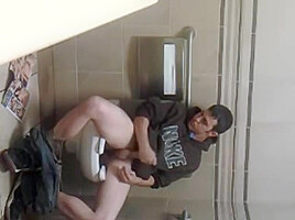 Guy caught masturbating in public bathroom...