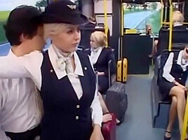 Busty stewardess gives handjob on bus,...