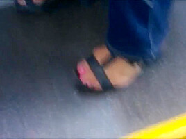 Candid sandals in bus...