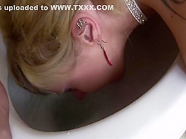 Facefucked slut gets her face toilet...