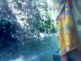  Malay Bathing At A River...